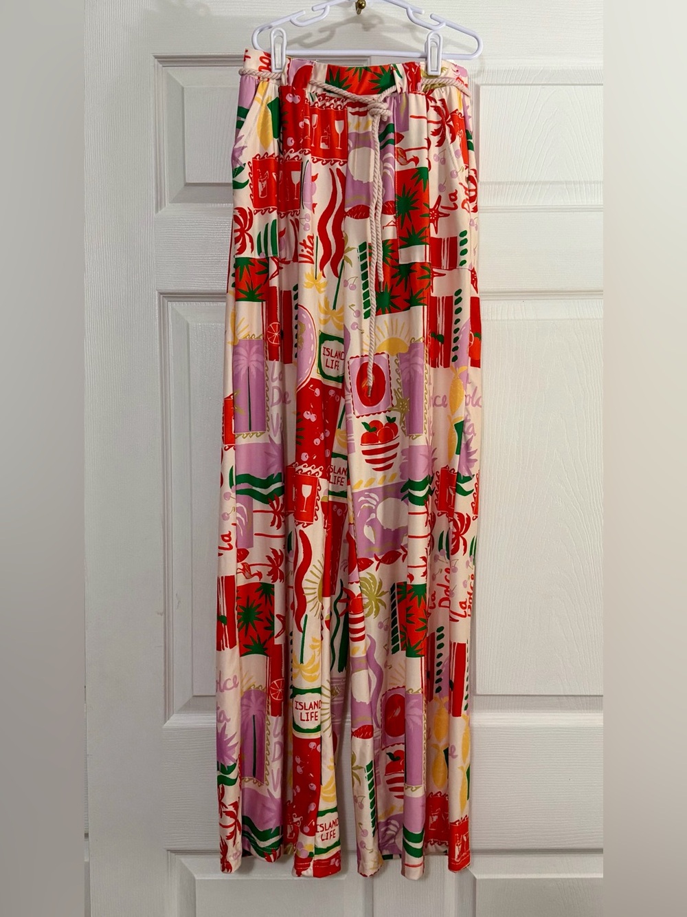 Tropical postcard-print wide-leg lounge pants.